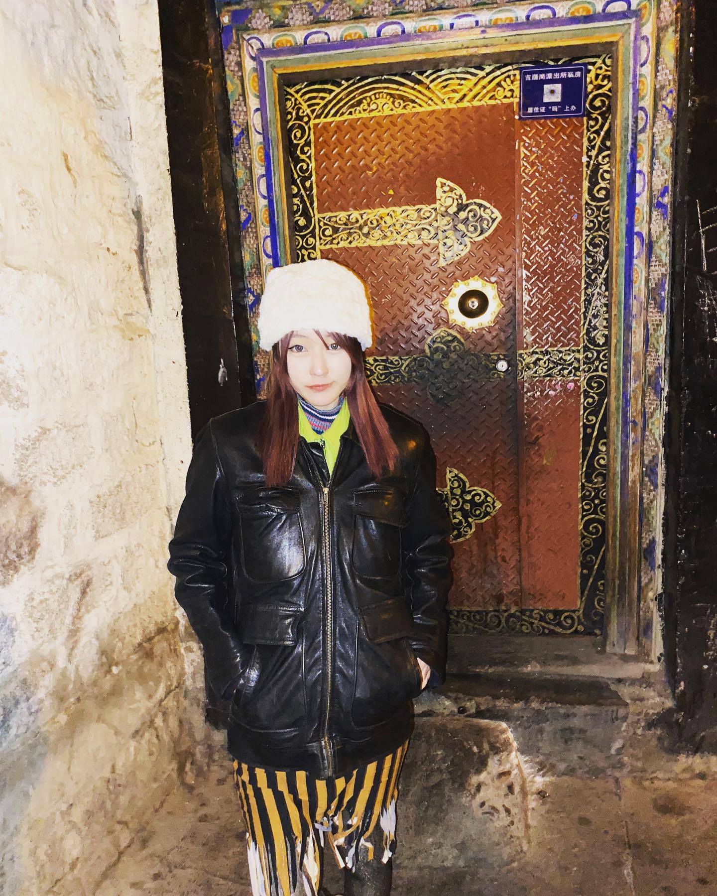 Portrait at ornate door